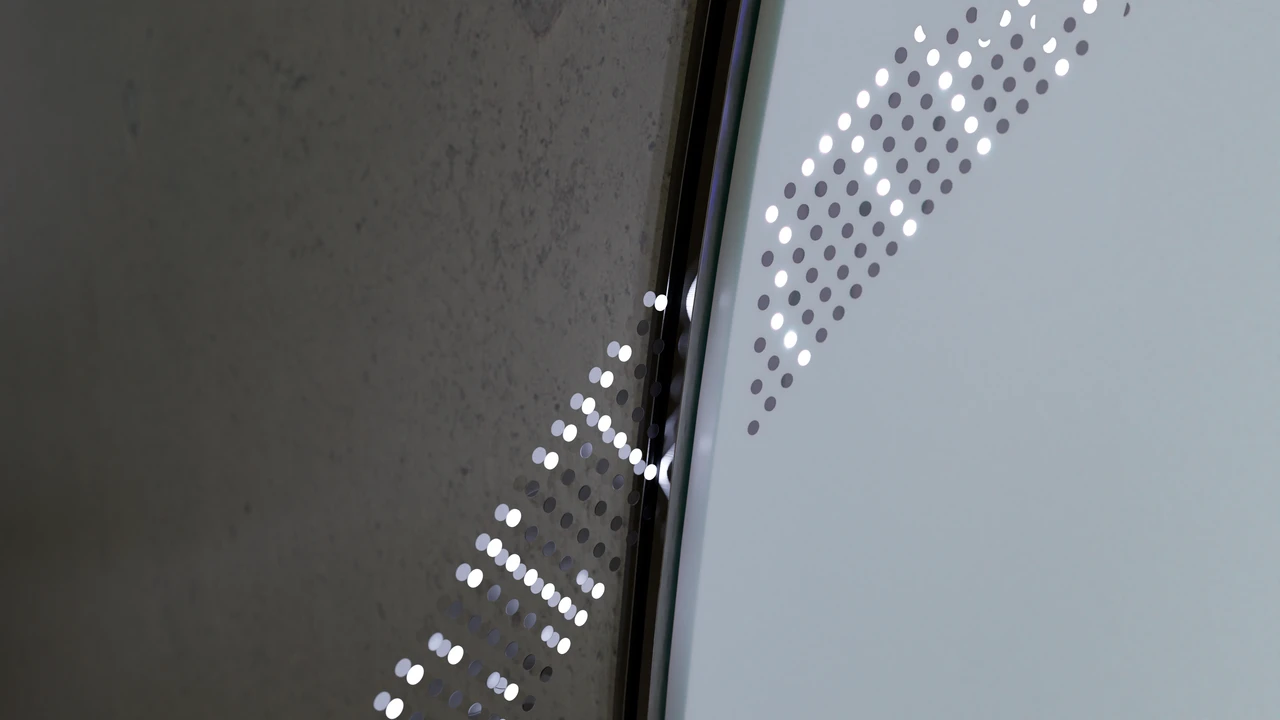 Detailaufnahme der Fassung der Glasfläche mit integrierter typografischer Lichtdarstellung